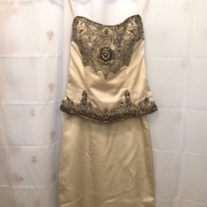From an $8000 dress. Ivory satin AMSALE Kenneth Poole 2 piece.
